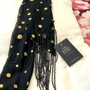Never worn scarf with beads and tag